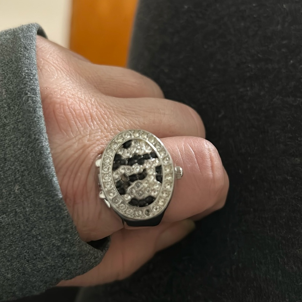 Cute P.O.V ring watch with rhinestones.